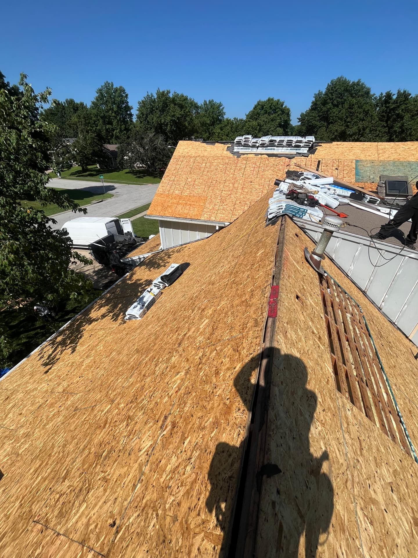 New roof decking installed during a complete tear-off and rebuild